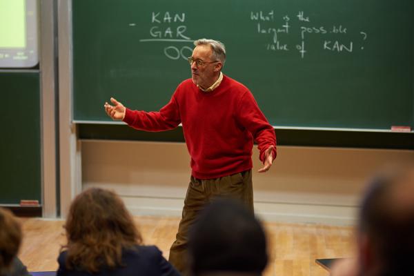 Charlie Gilderdale from NRICH leading interactive talk session at the Centre for Mathematical Sciences